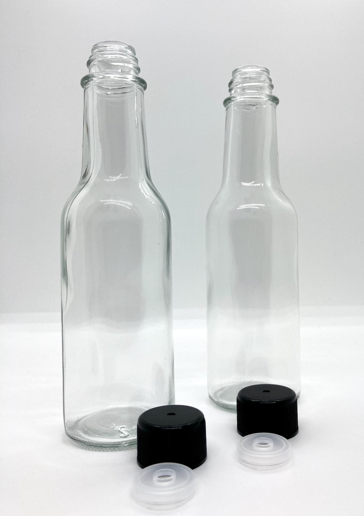 150mL. (Woozy Bottle) Clear Round Glass Bottle with Black Cap