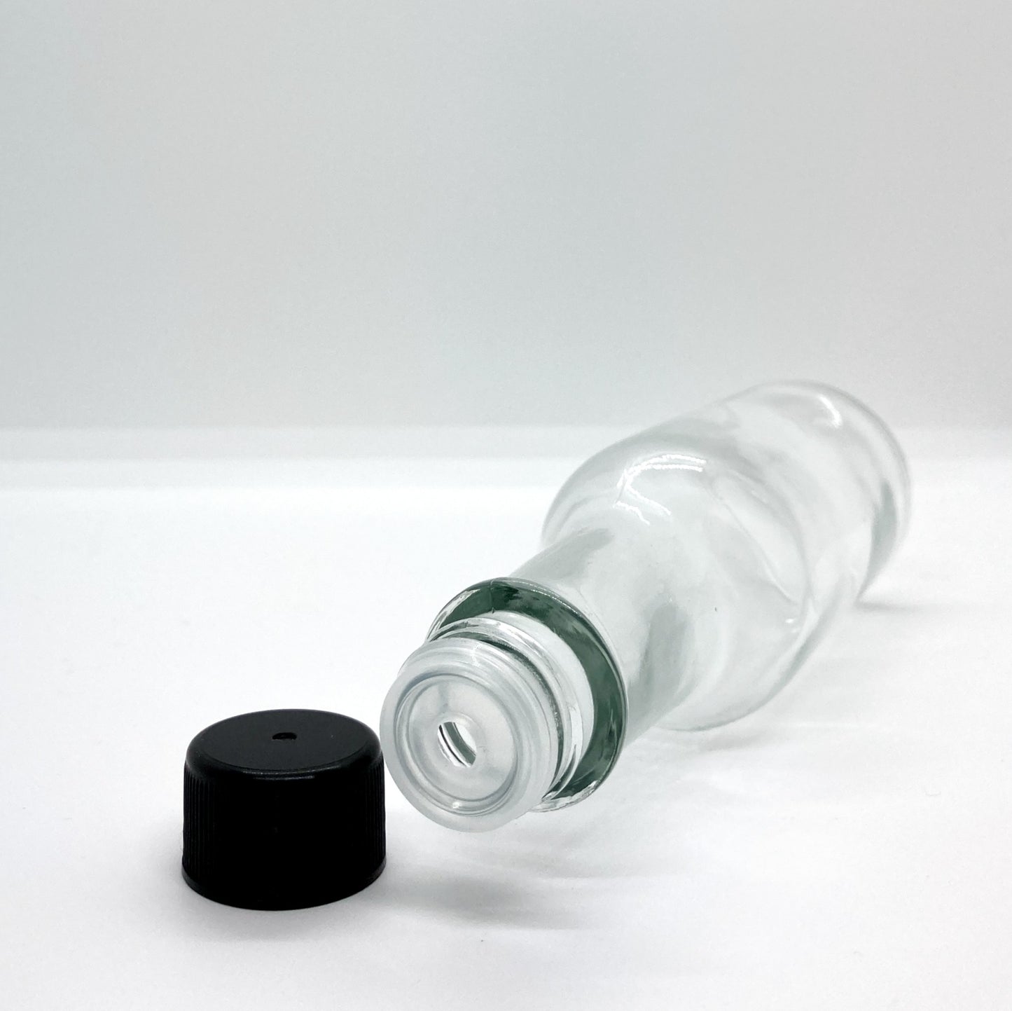 150mL. (Woozy Bottle) Clear Round Glass Bottle with Black Cap