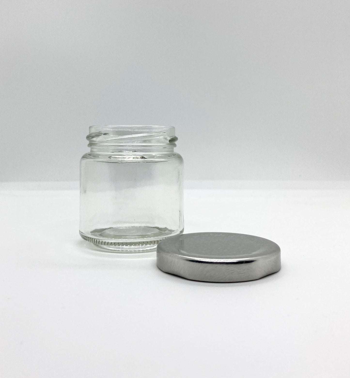 100mL. Clear Round Straight Cut Glass Jar and Lid (Net Fill Capacity: 70mL.+/-)