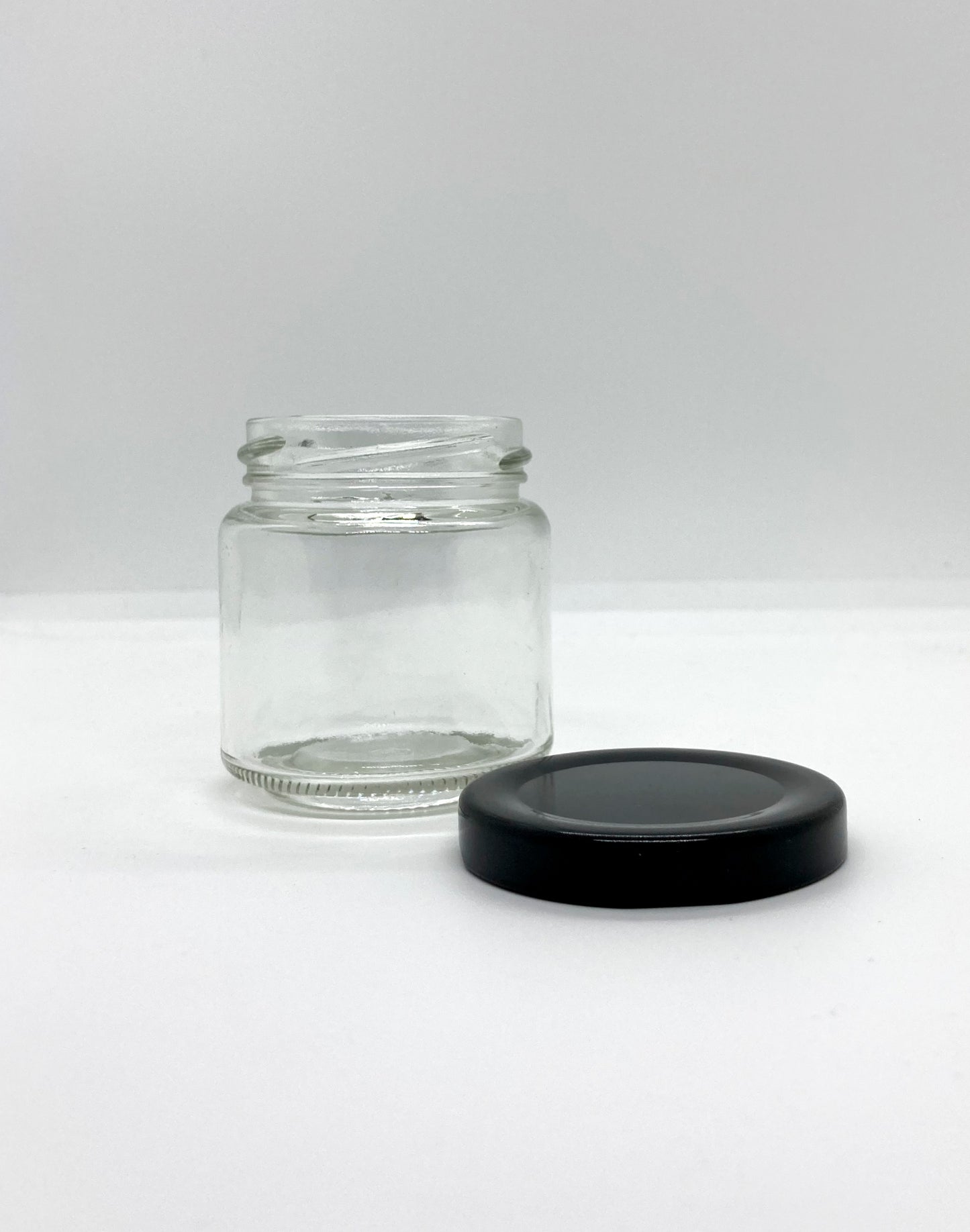 100mL. Clear Round Straight Cut Glass Jar and Lid (Net Fill Capacity: 70mL.+/-)