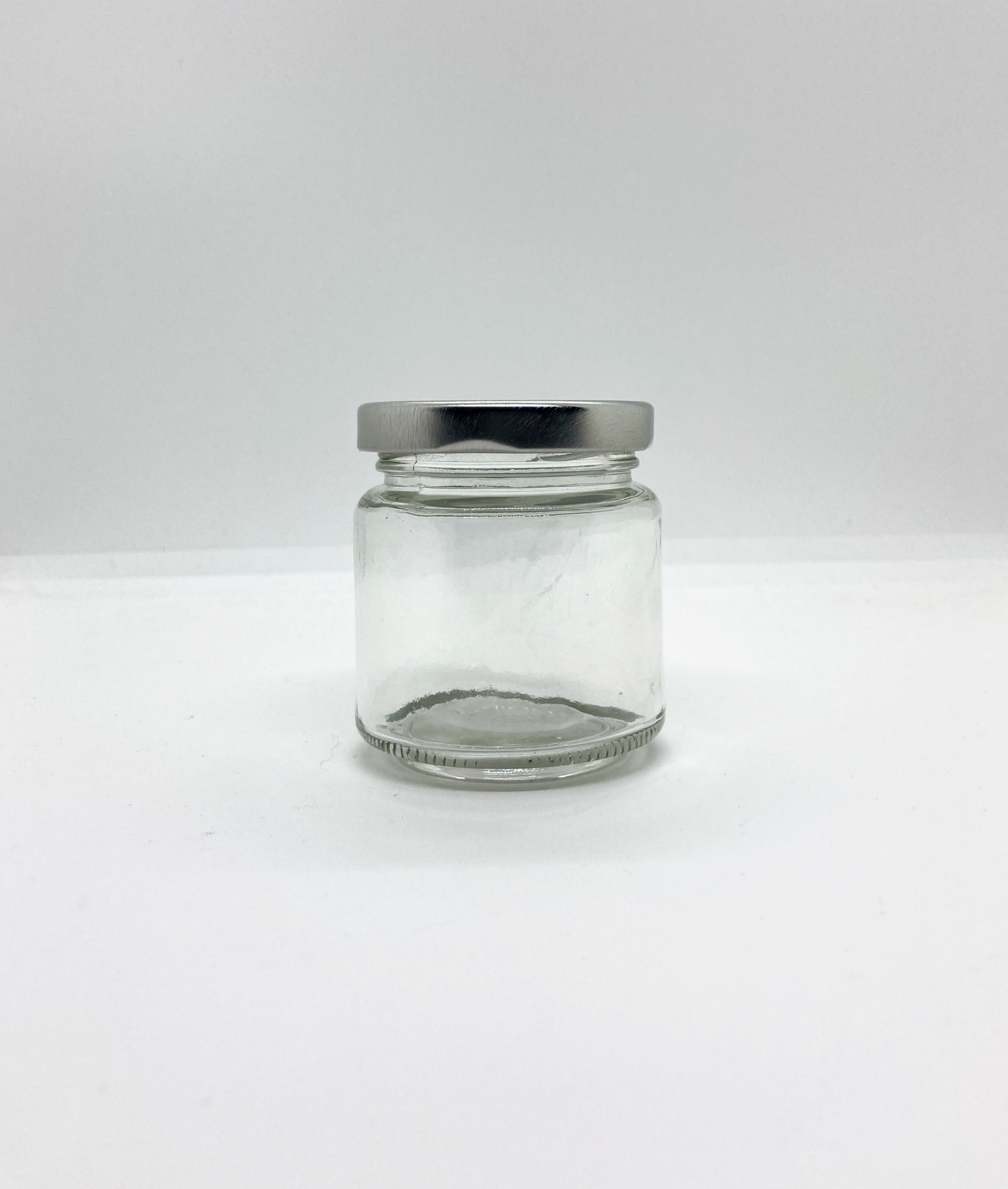 100mL. Clear Round Straight Cut Glass Jar and Lid (Net Fill Capacity: 70mL.+/-)