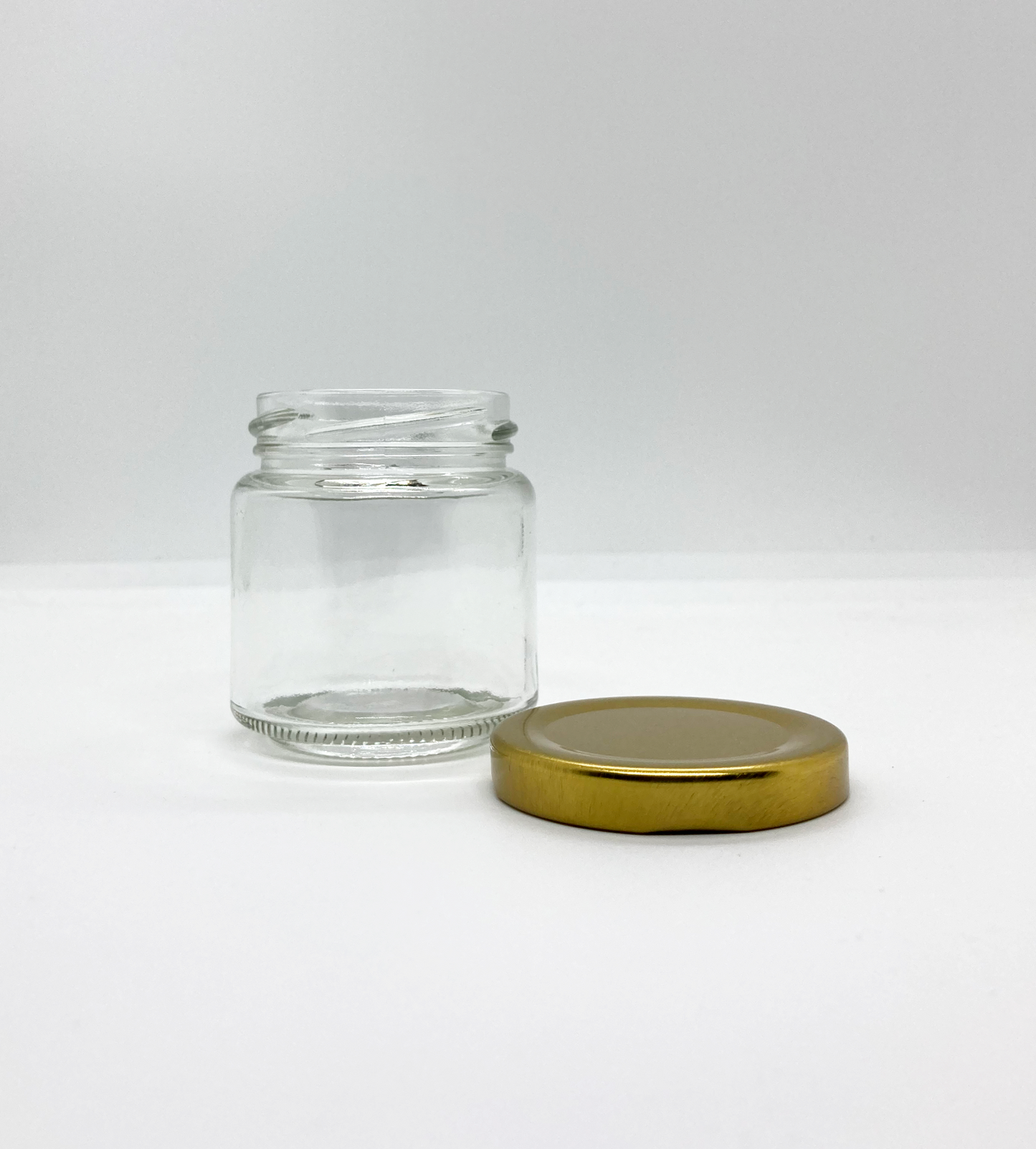 100mL. Clear Round Straight Cut Glass Jar and Lid (Net Fill Capacity: 70mL.+/-)