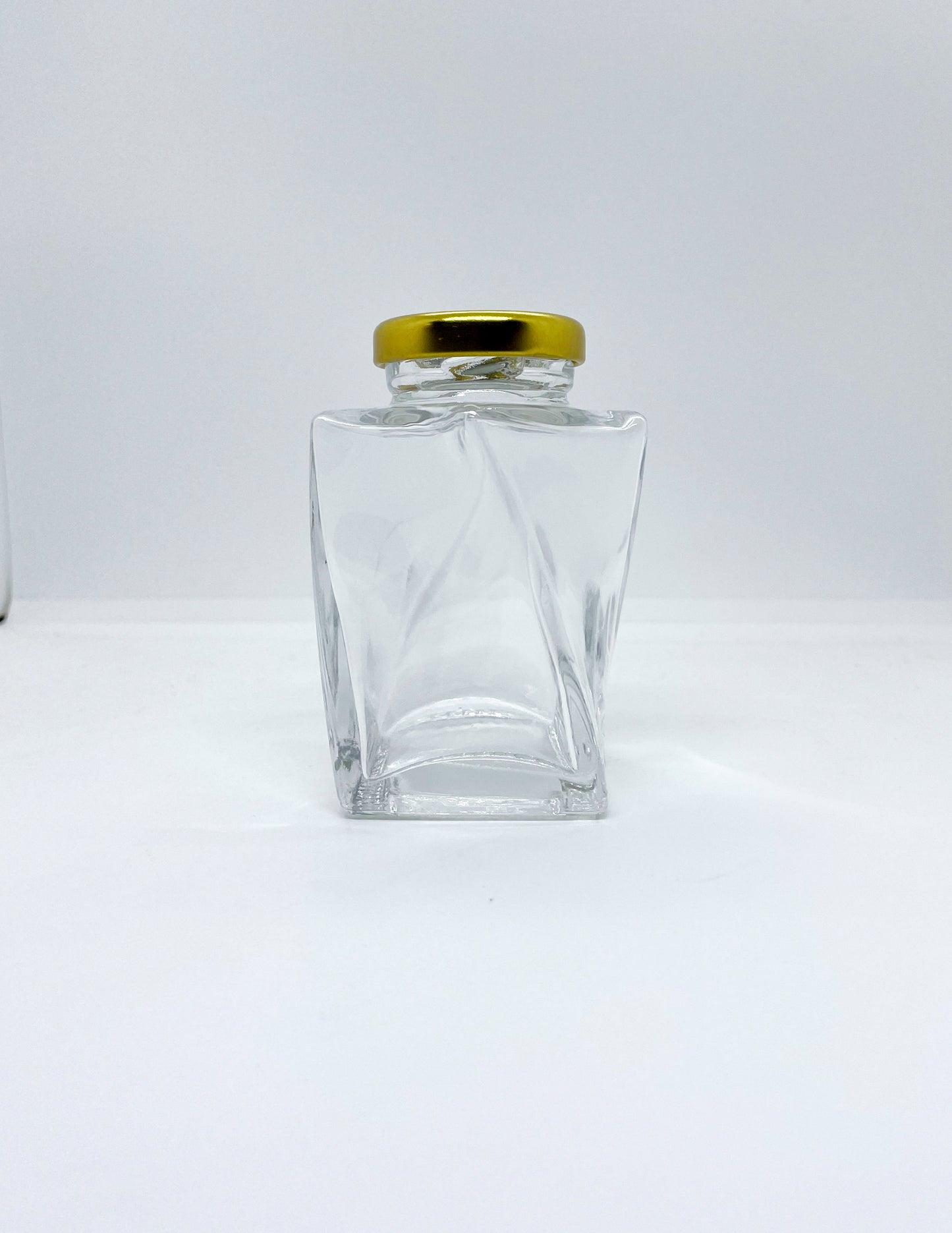 155mL. The Twist Glass Jar and Lid (Net Fill Capacity: 135mL.+/-)